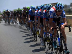 lots of cyclists riding and wearing Castelli cafe clothing