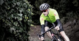 Man on a bike wearing Castelli cafe clothing