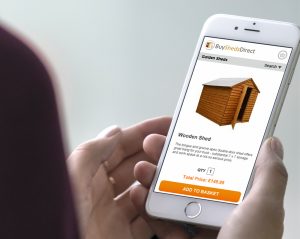 customer browsing Buy Sheds Direct website on smartphone