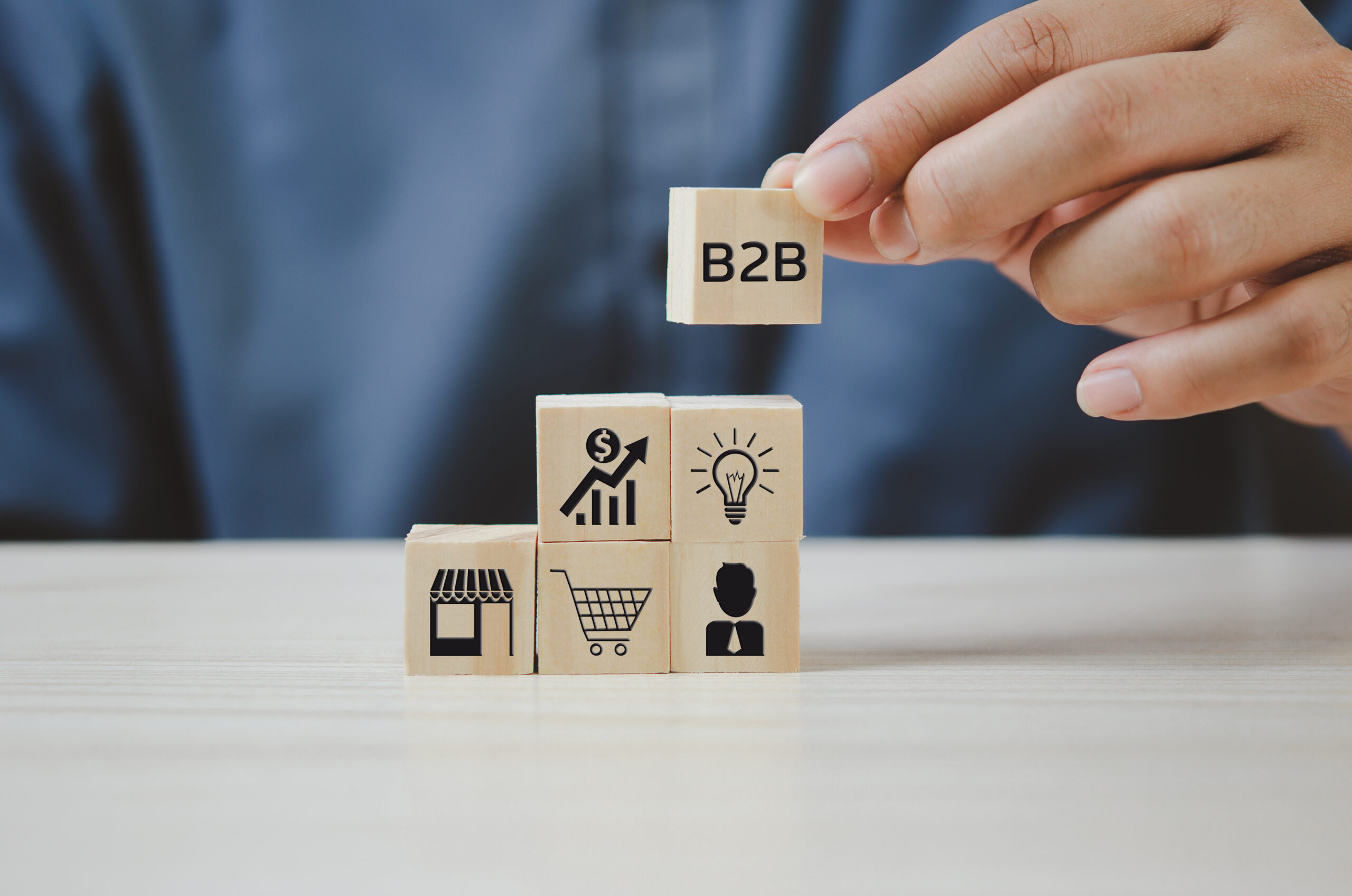 wooden blocks with b2b symbols